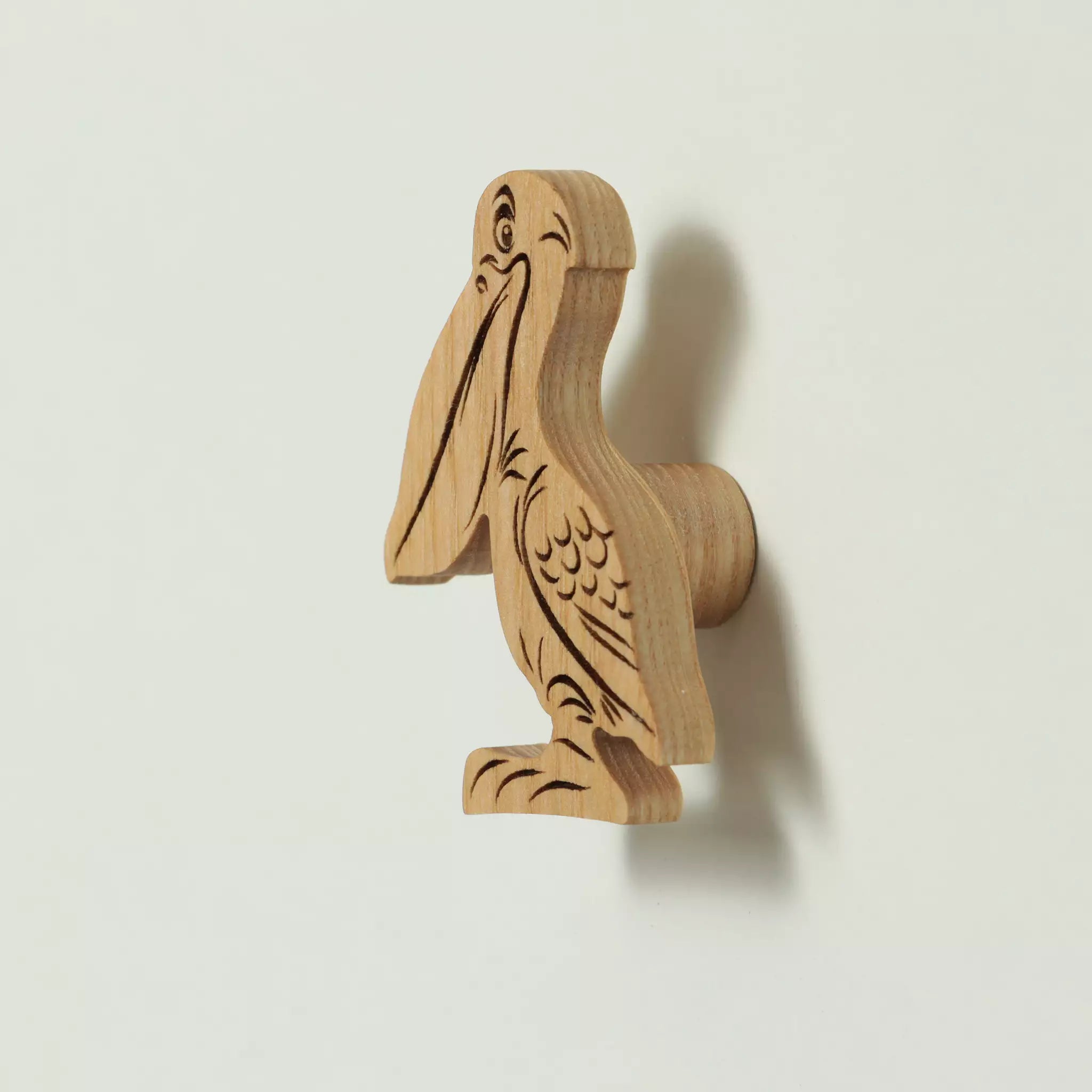 Tiger cub cabinet knob in solid ash, engraved and cut to the outline of the animal