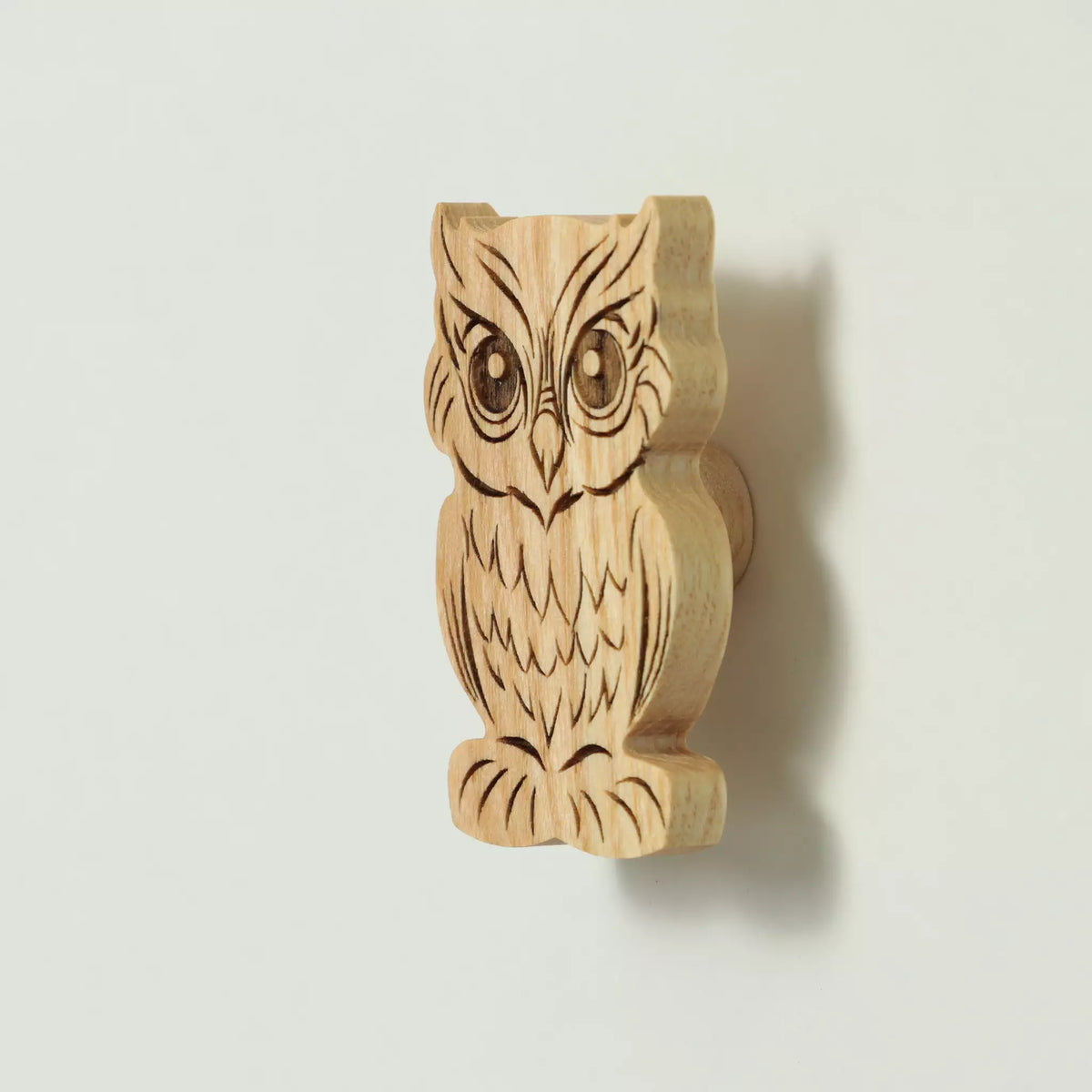 Owl cabinet knob in solid ash, engraved and cut to the outline of the bird