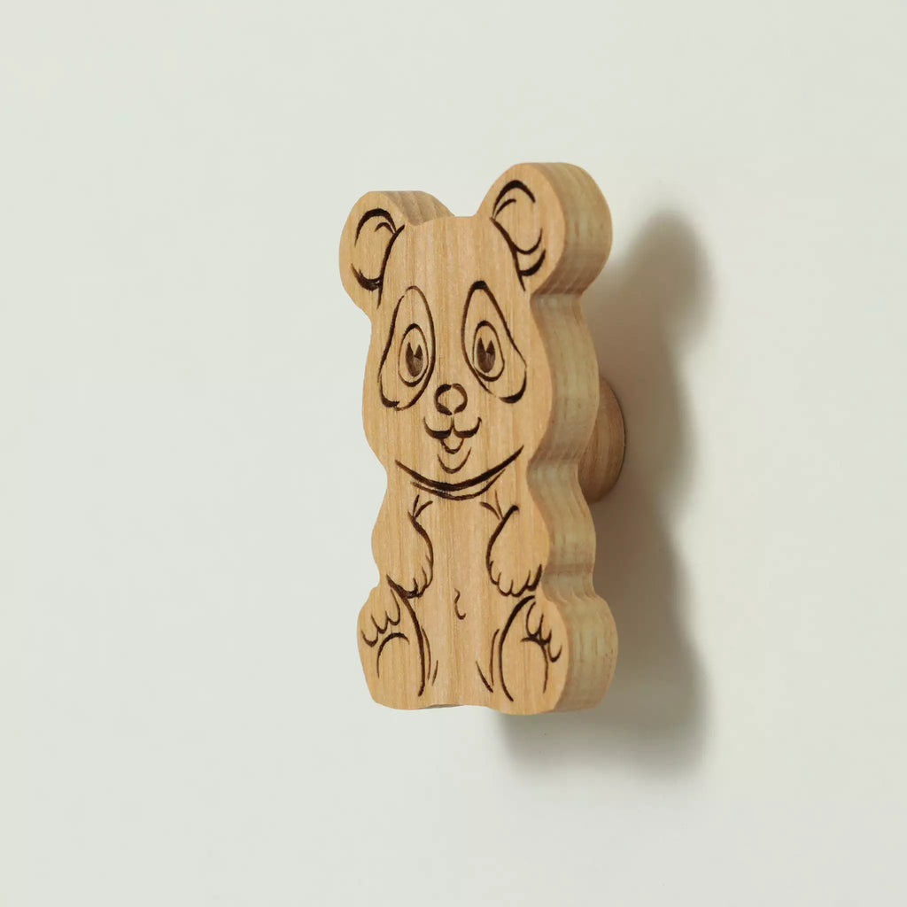 Panda cabinet knob in solid ash, engraved and cut to the outline of the animal
