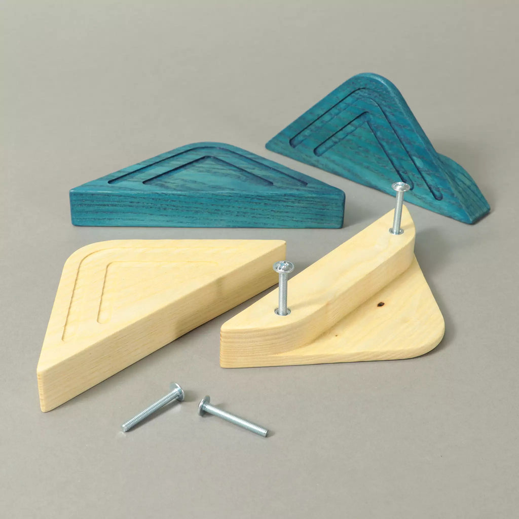 Half-diamond ash pulls with two carved lines, loose on a grey background with the mounting screws