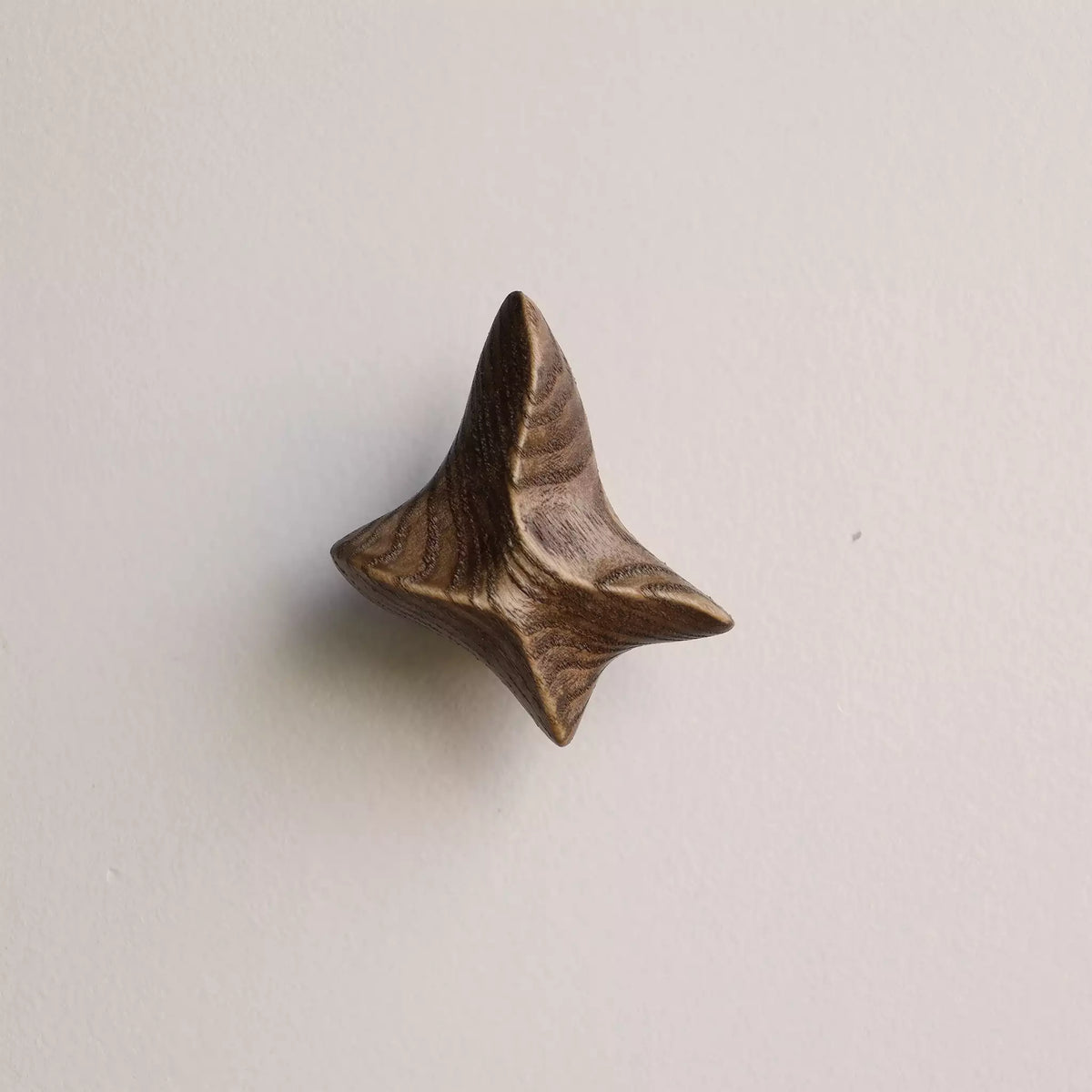 Star hook in the walnut finish, seen from above