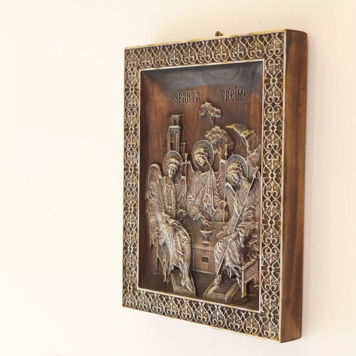 Side view of the icon, showing the thickness of the panel and the pale wood edge