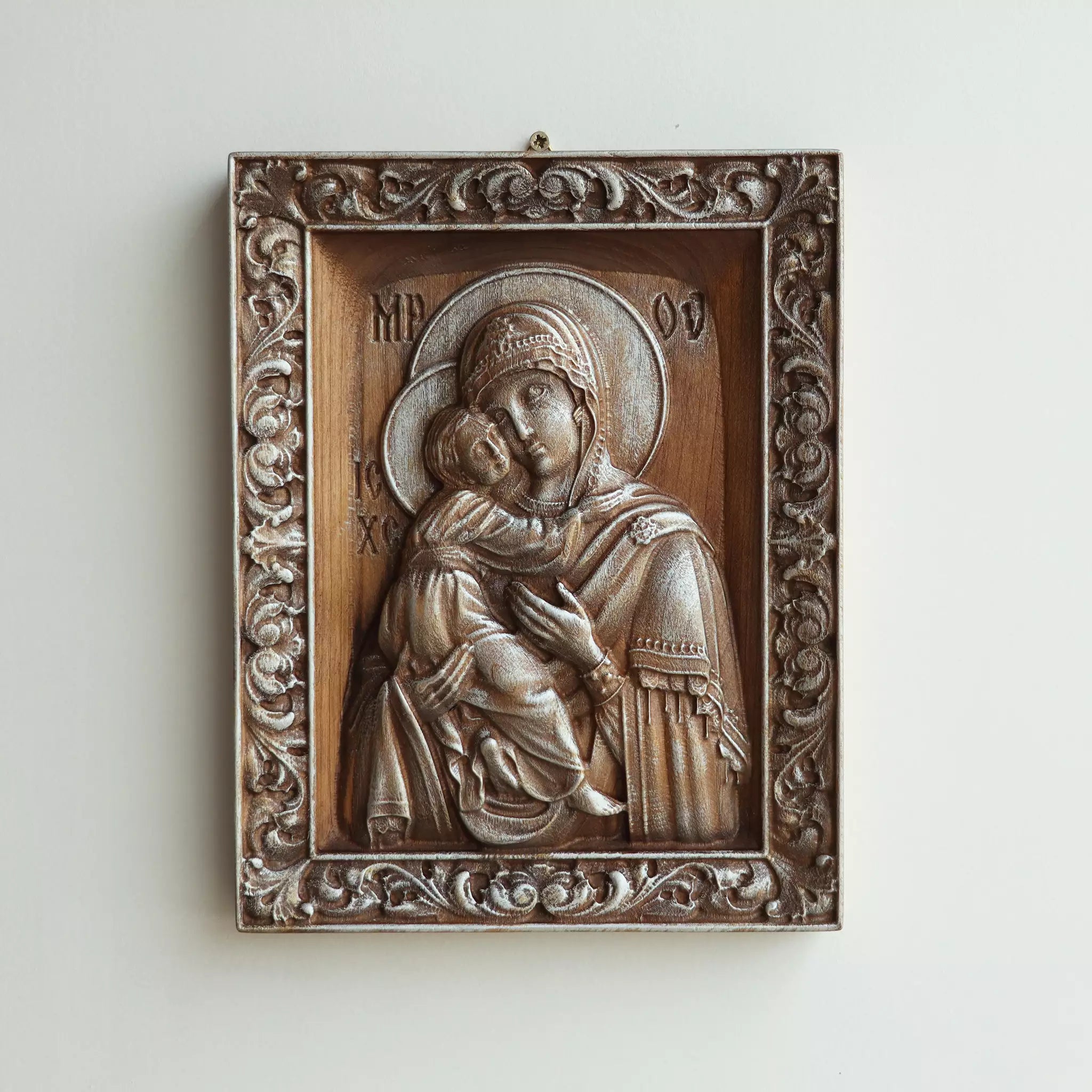 The icon hanging flat on a wall, seen straight on