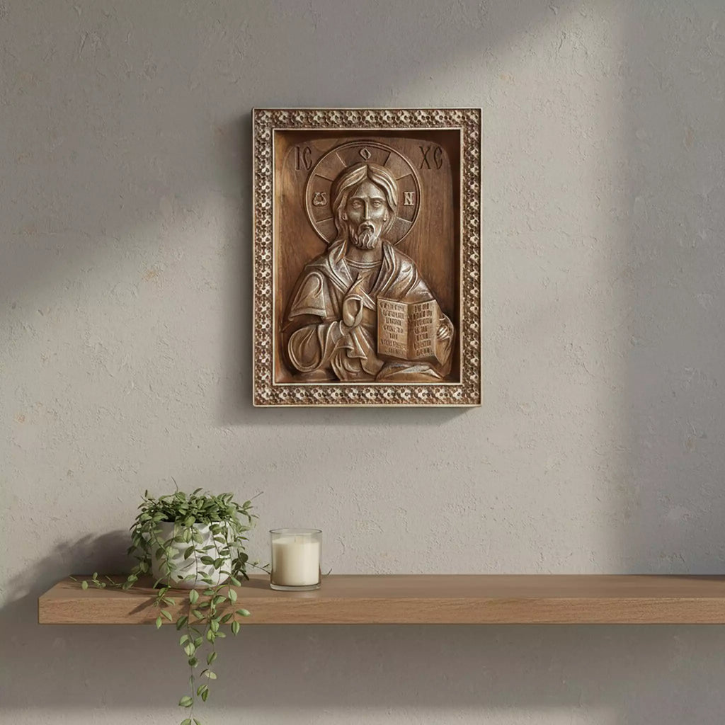 The icon hung above a floating shelf with a trailing plant and a candle