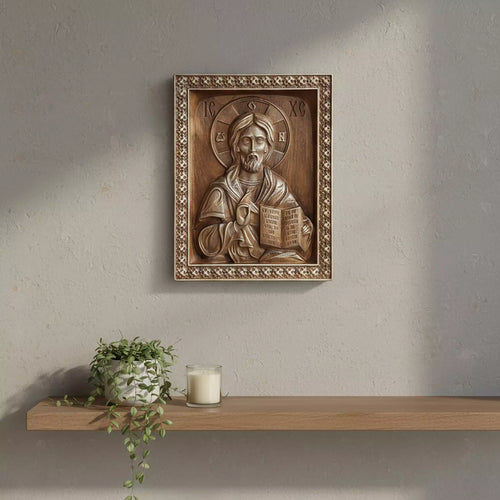 The icon hung above a floating shelf with a trailing plant and a candle