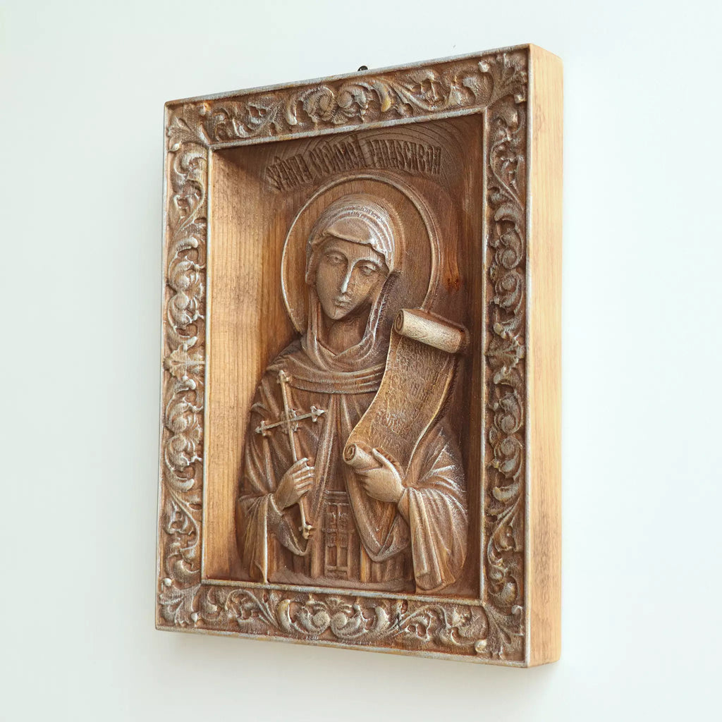 Side view of the icon, showing the thickness of the panel and the pale wood edge