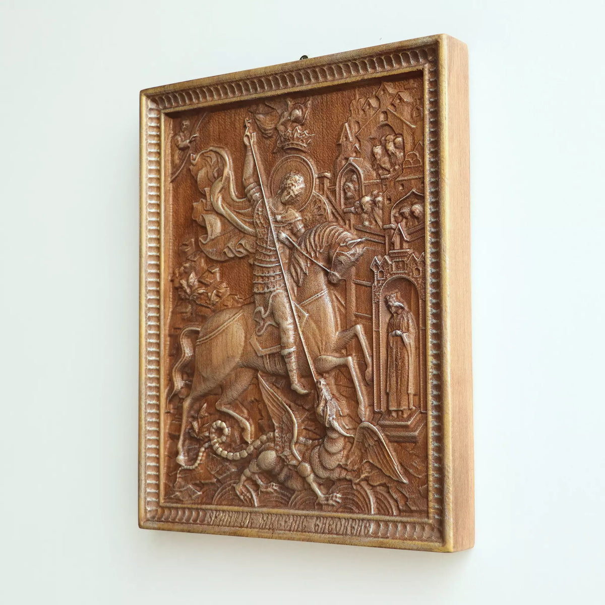 Side view of the icon, showing the thickness of the panel and the pale wood edge