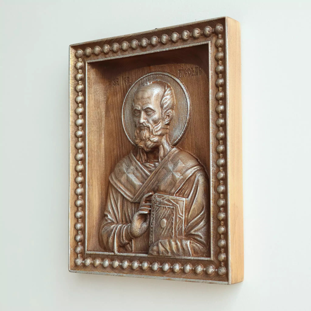 Side view of the icon, showing the thickness of the panel and the pale wood edge