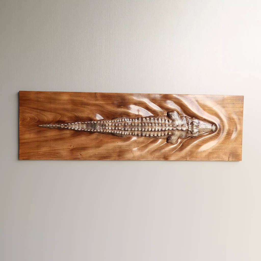 The horizontal panel seen at an angle, showing how far the carving stands out from the board
