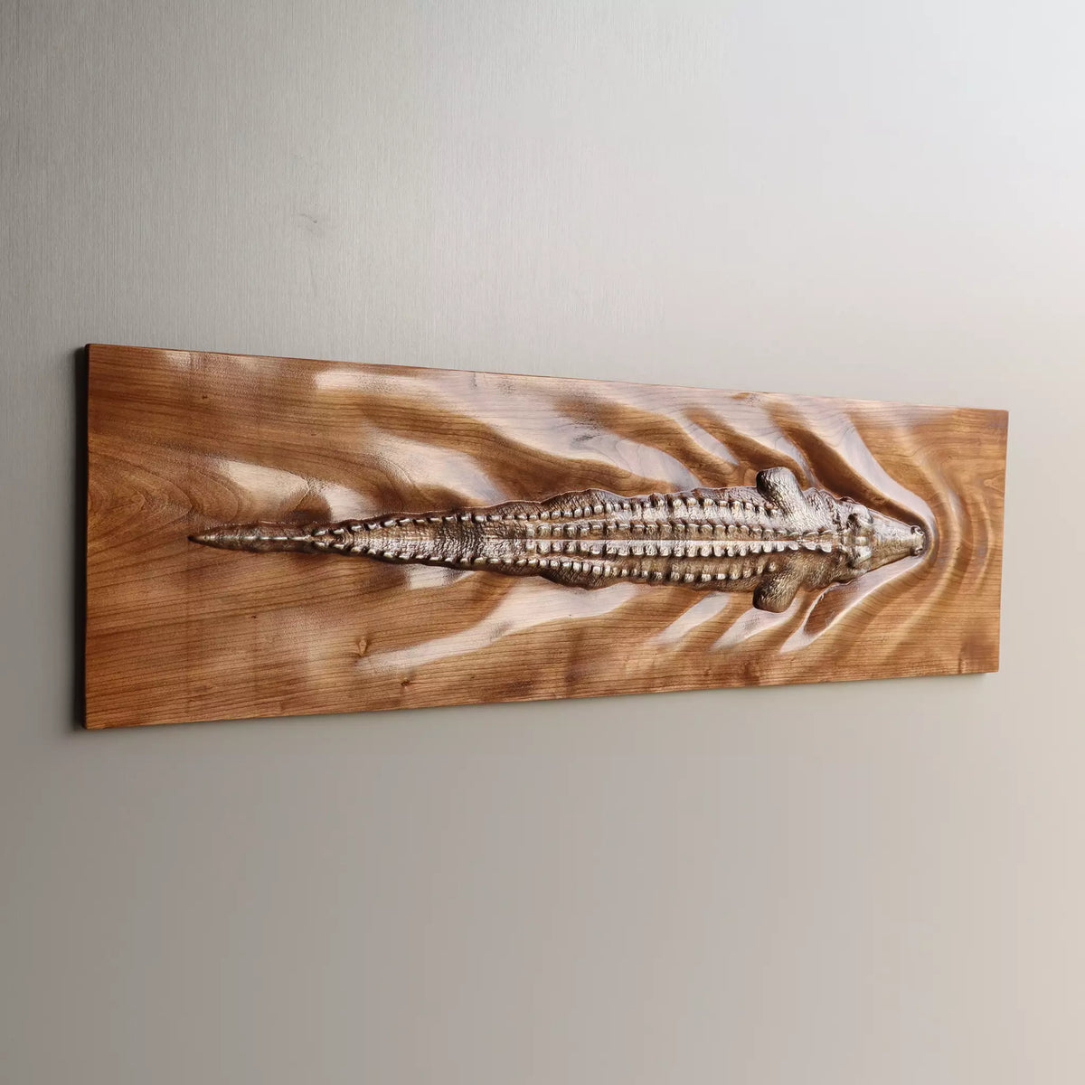 The horizontal panel from one side, the wake ridges catching the light