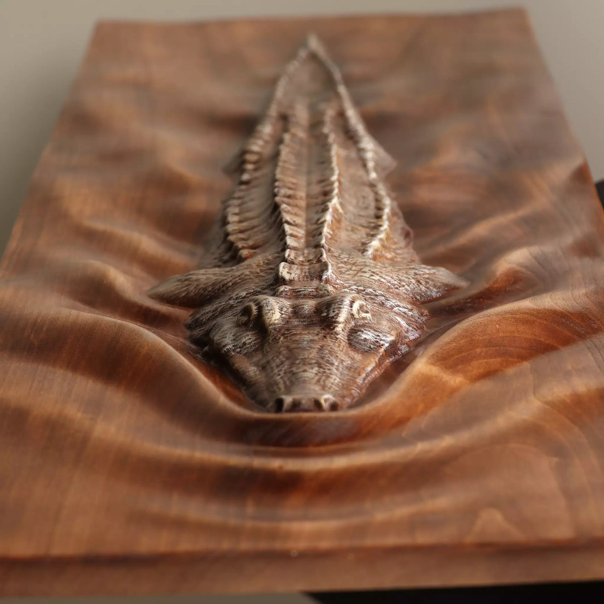 Close view of the head, showing the eye and the carved jaw