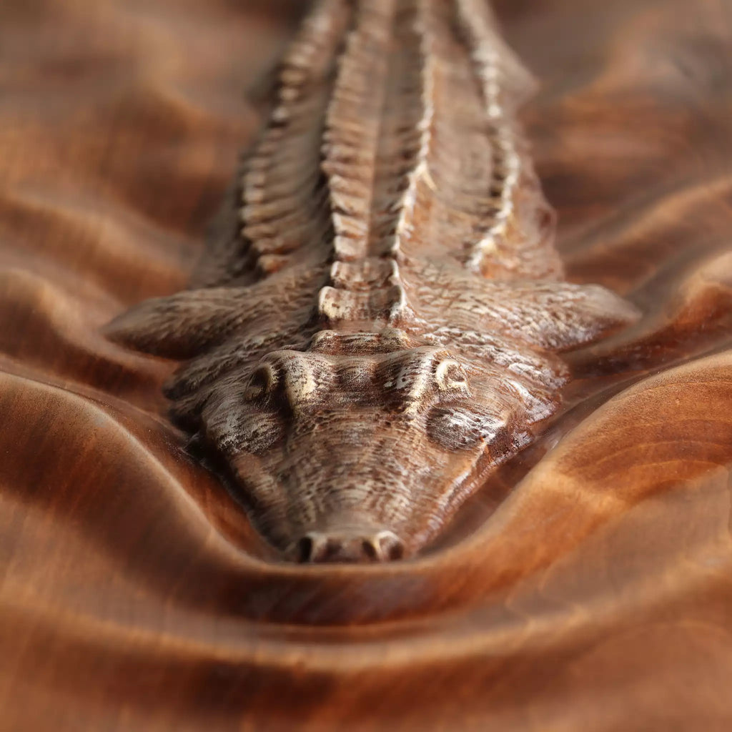 Close view of the carved scales along the back and the ridges of the wake