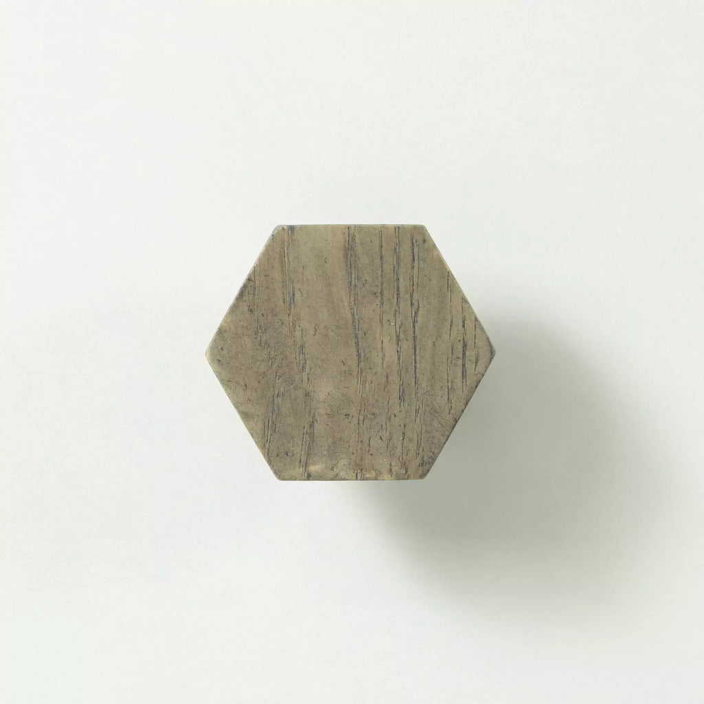 Hexagon cabinet knob in the Dark Gray finish seen from the front, showing the flat face