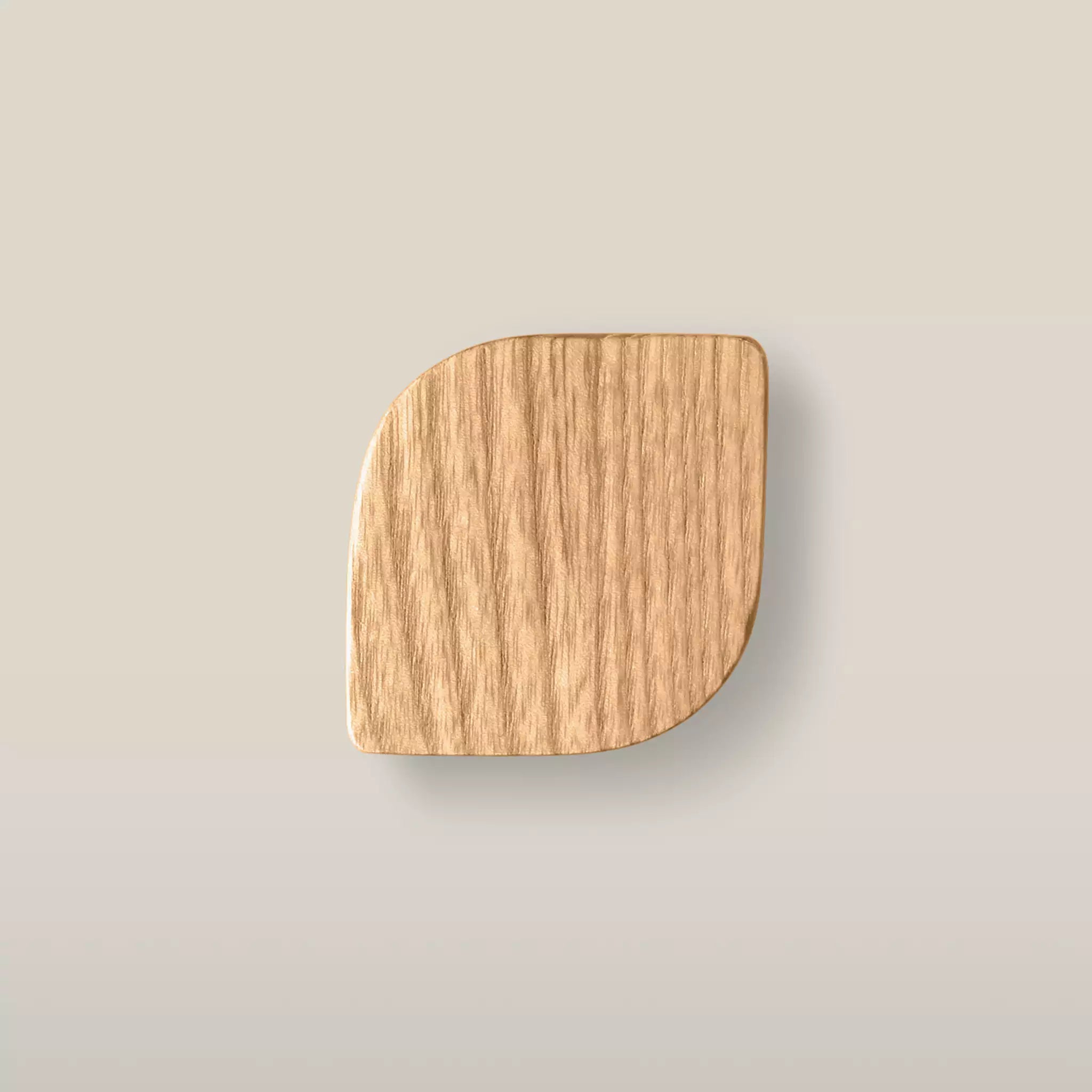 Solid ash leaf cabinet knob in the Caffe Latte finish, front view