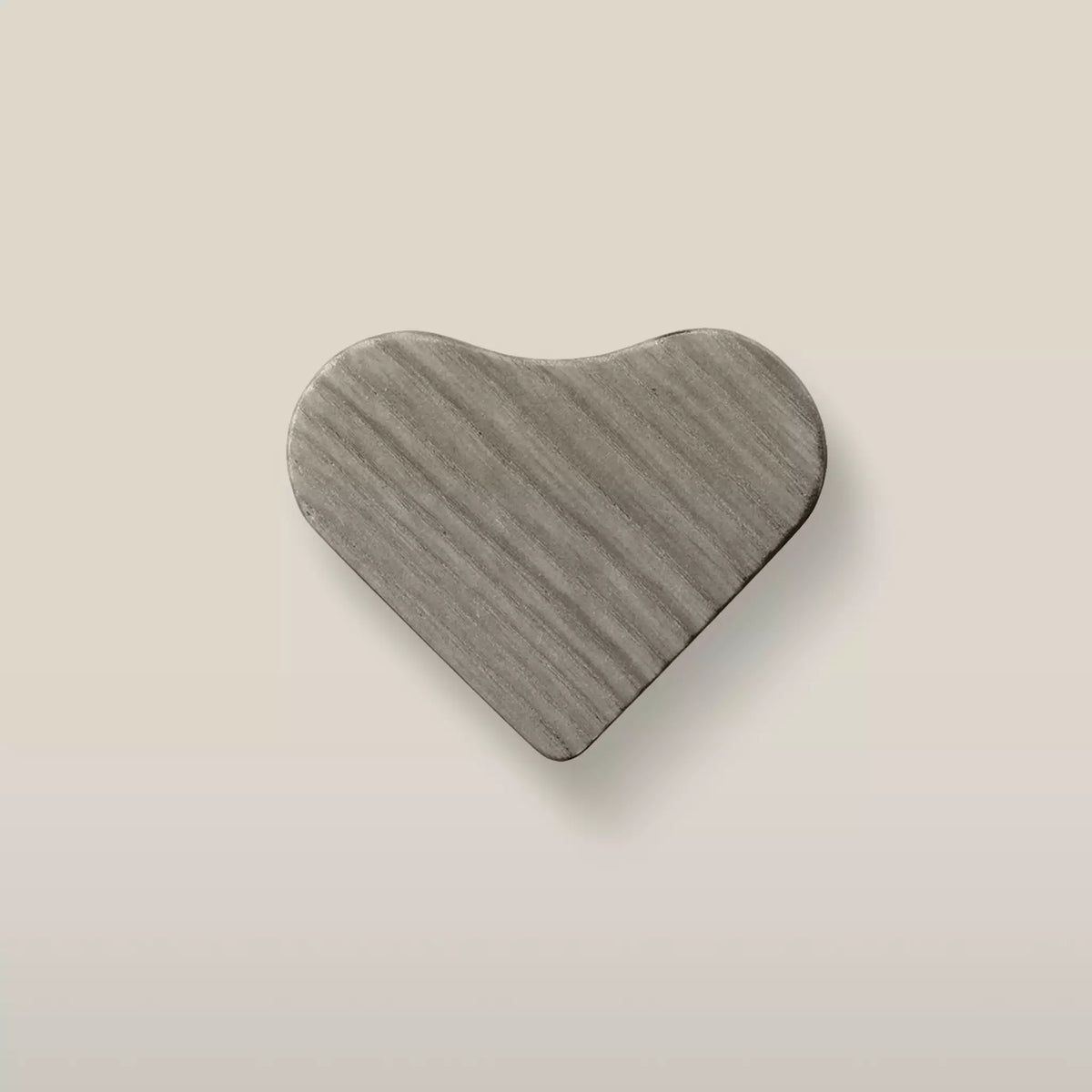 Solid ash smooth heart cabinet knob in the Dark Gray finish, front view