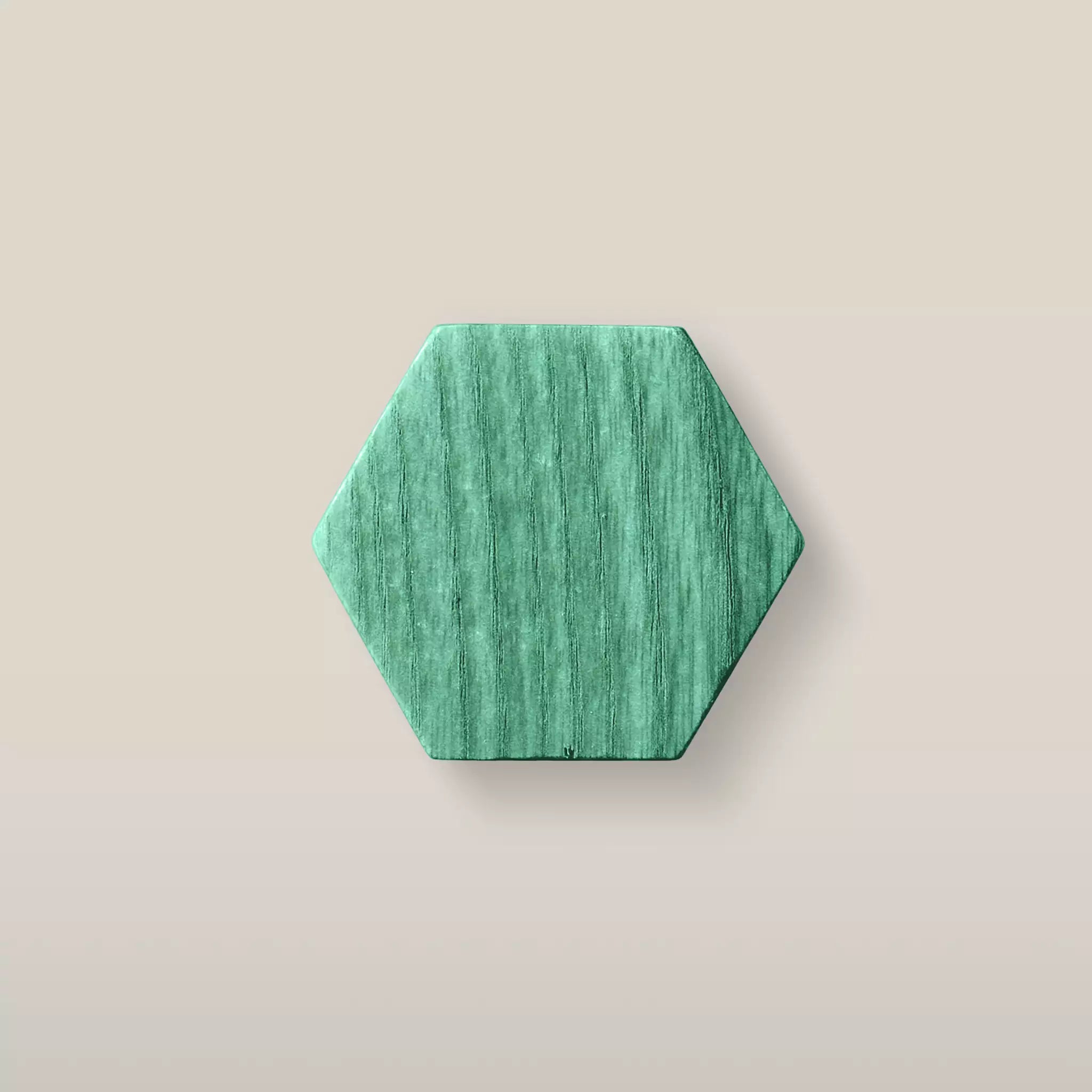 Solid ash hexagon cabinet knob in the Green finish, front view