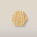 Solid ash hexagon cabinet knob in the Unfinished finish, front view