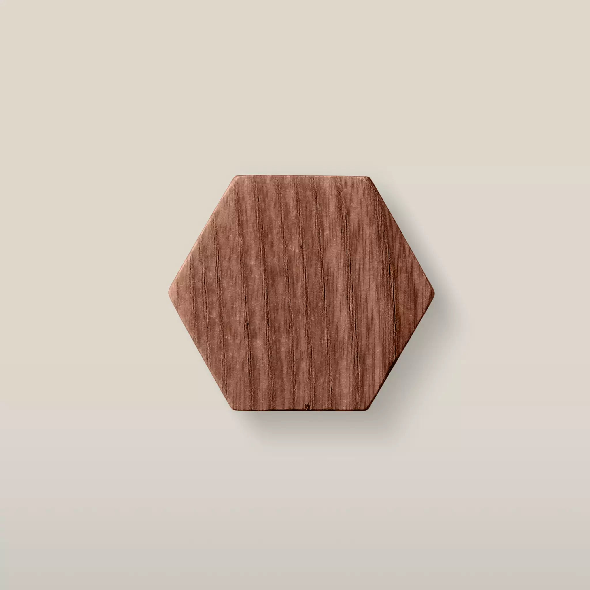Solid ash hexagon cabinet knob in the Walnut finish, front view