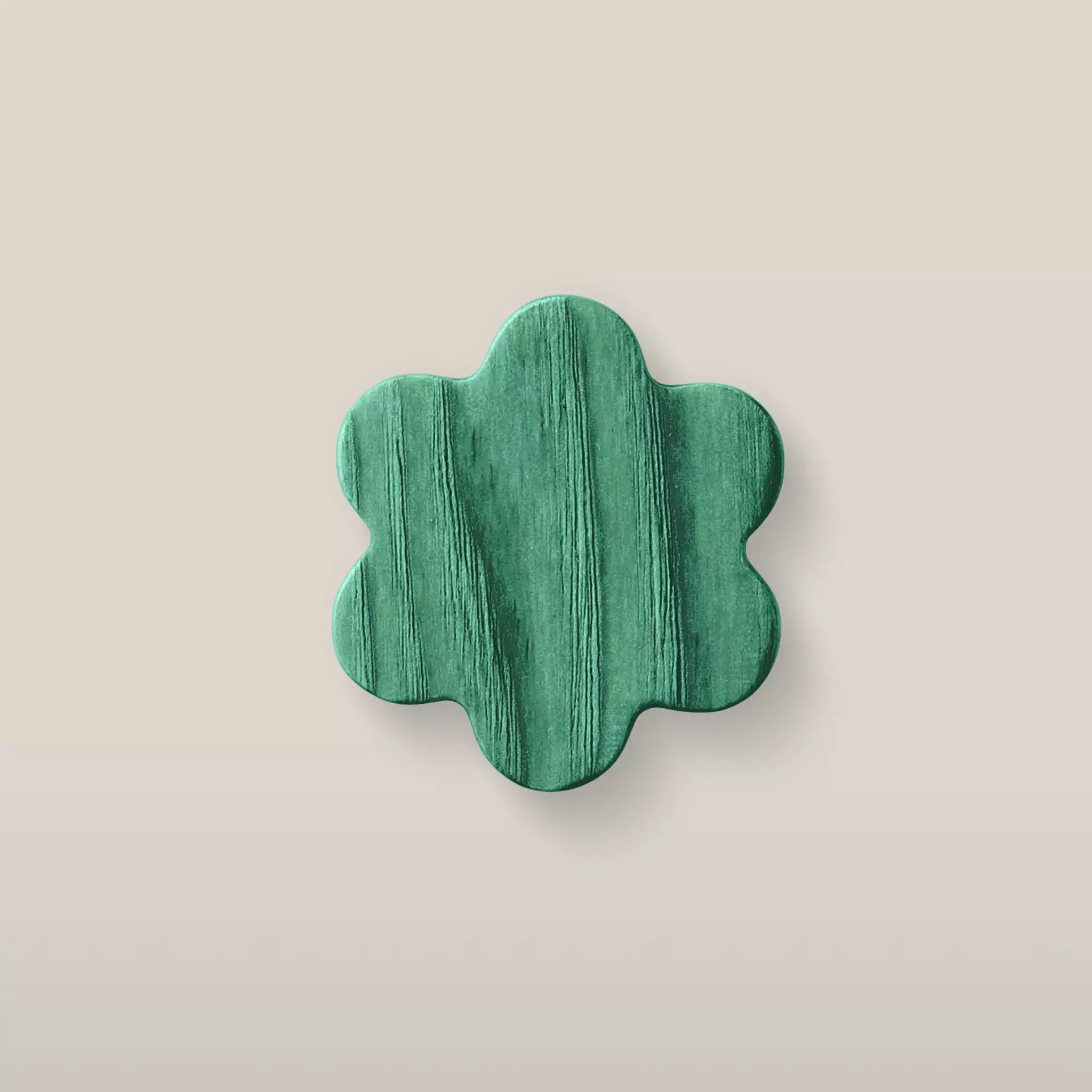 Solid ash flower cabinet knob in the Green finish, front view