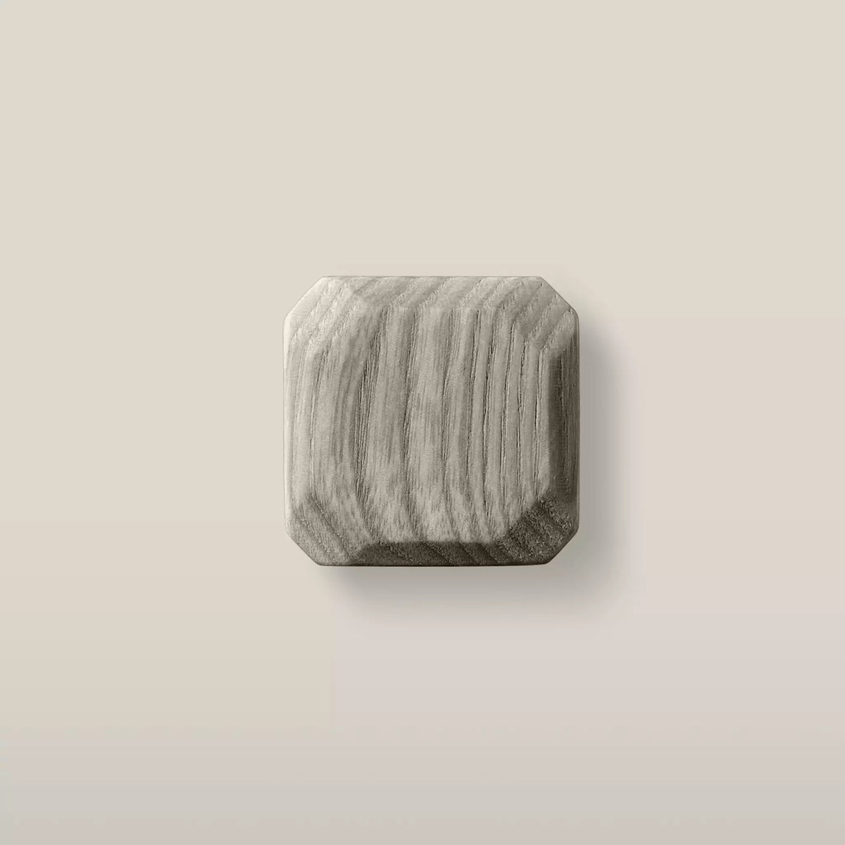 Octagonal ash cabinet knob in Dark Gray, a muted stone grey