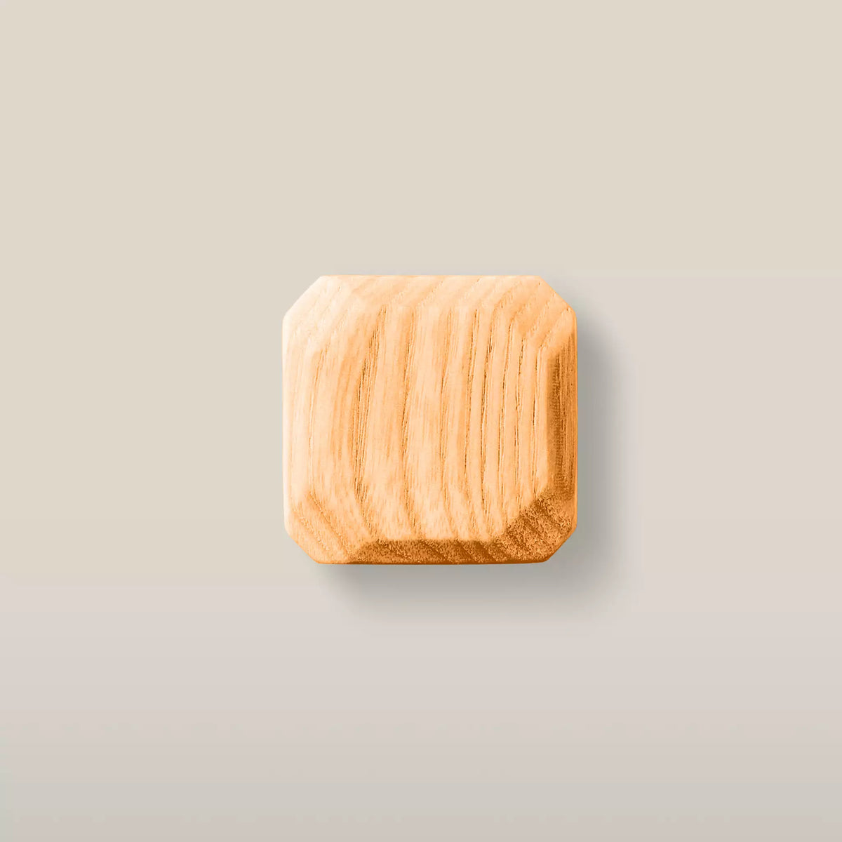 Octagonal ash cabinet knob in Orange, a warm apricot