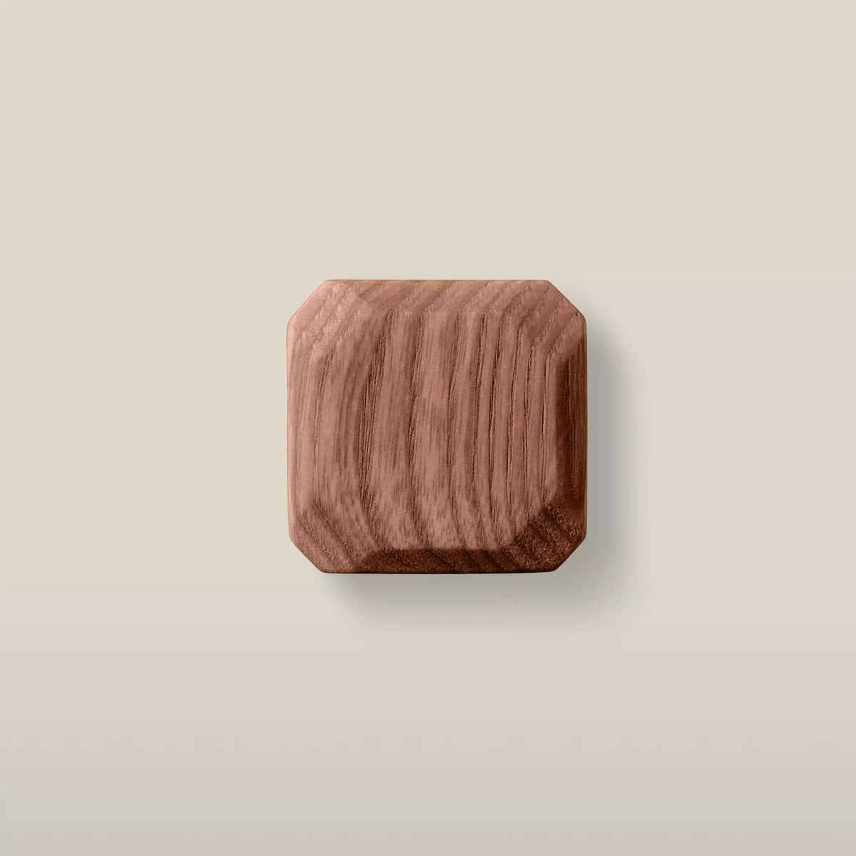 Octagonal ash cabinet knob in Walnut, a deep reddish brown