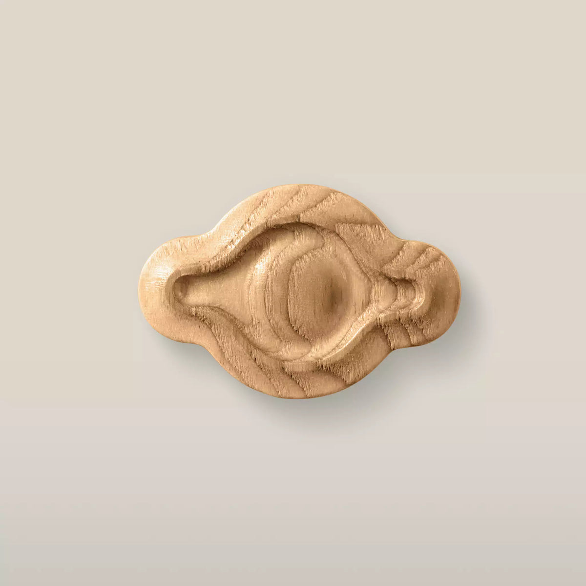 Solid ash petal cabinet knob in the Caffe Latte finish, front view