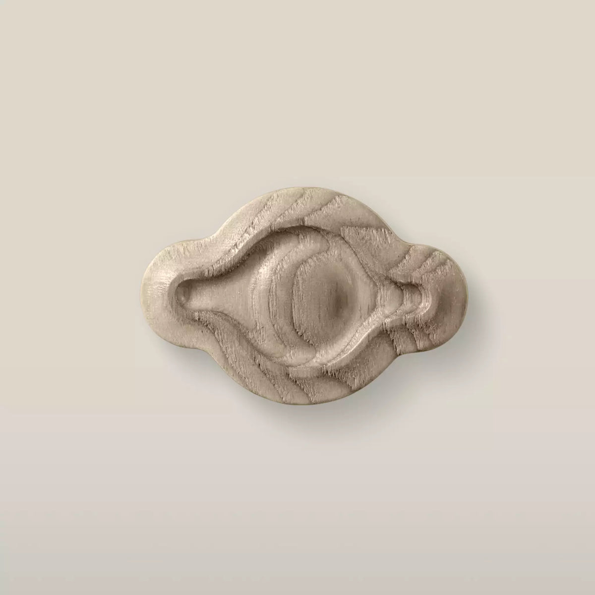 Solid ash petal cabinet knob in the Cappuccino finish, front view