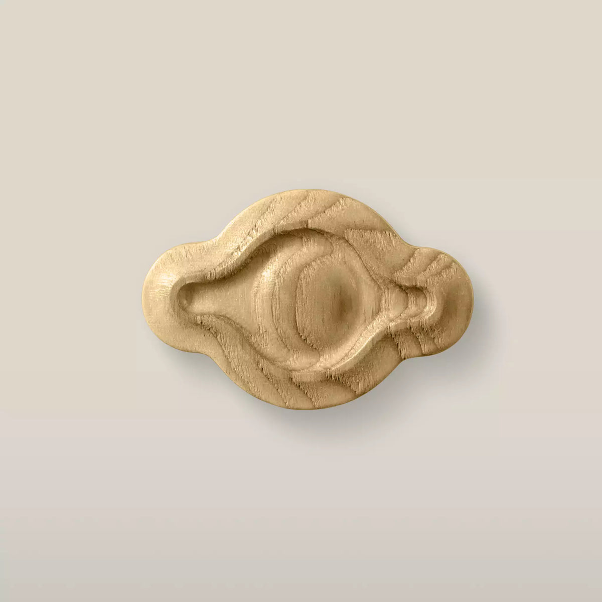 Solid ash petal cabinet knob in the Oiled finish, front view