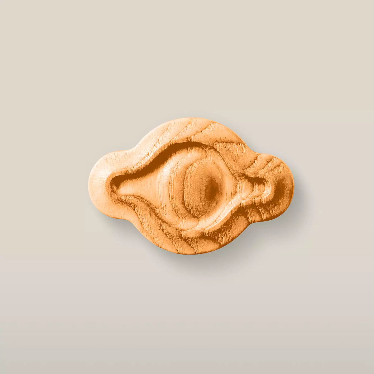 Solid ash petal cabinet knob in the Orange finish, front view