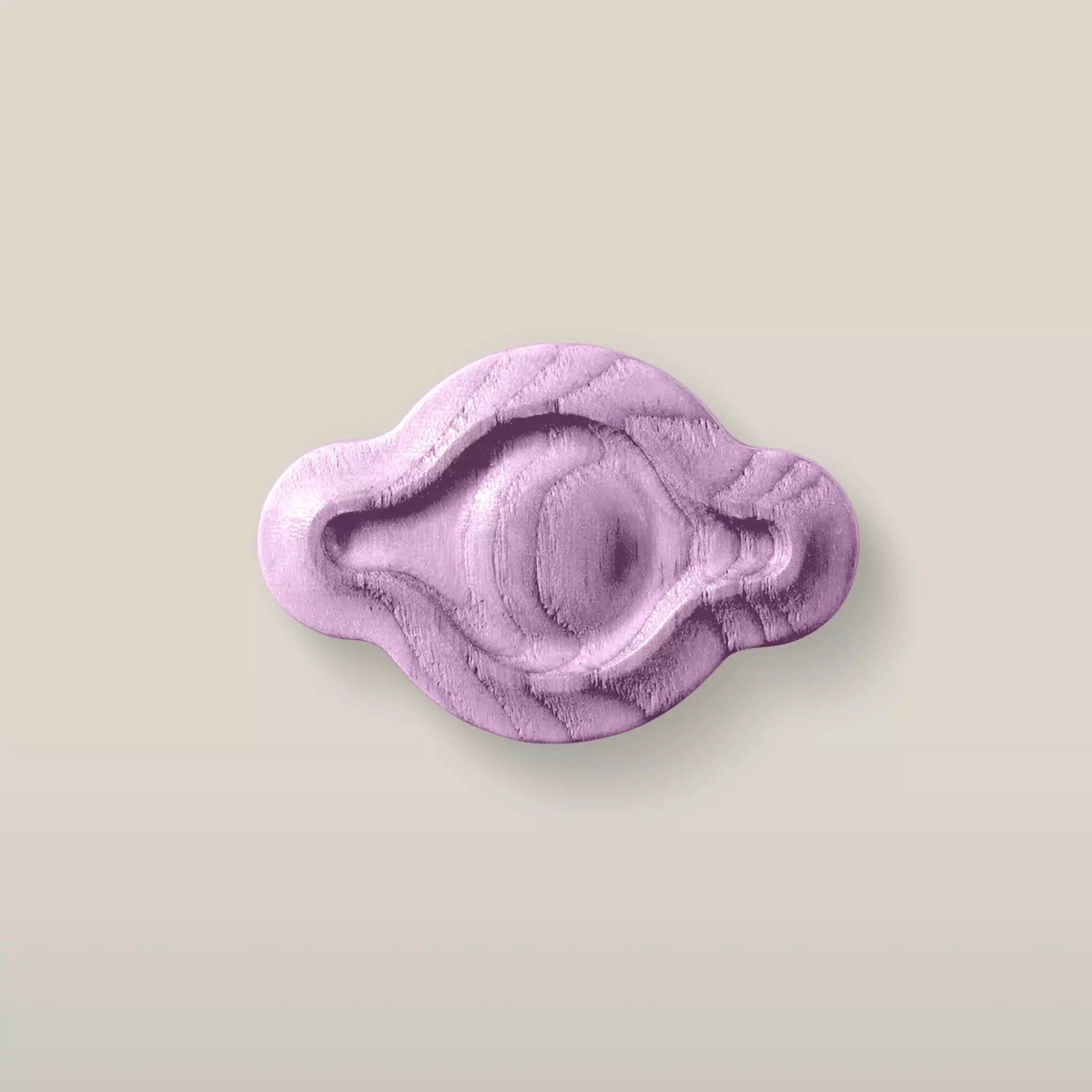 Solid ash petal cabinet knob in the Purple finish, front view