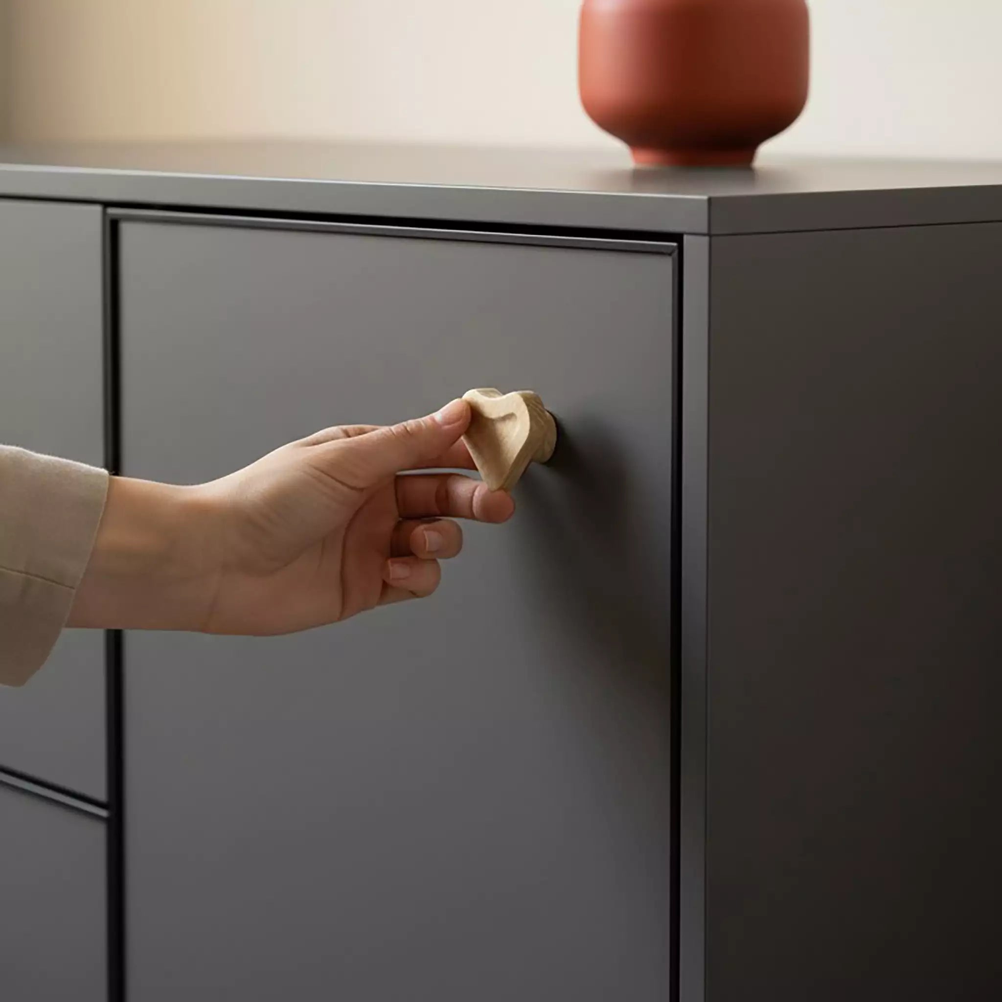 Solid ash scooped heart cabinet knob, front view