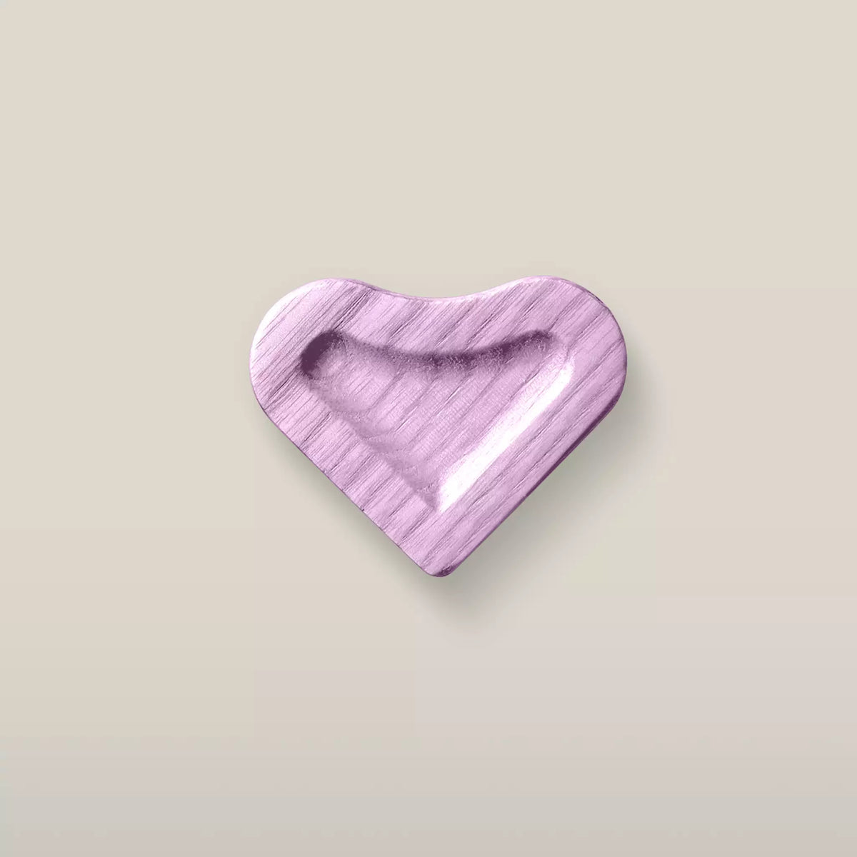 Solid ash scooped heart cabinet knob in the Purple finish, front view