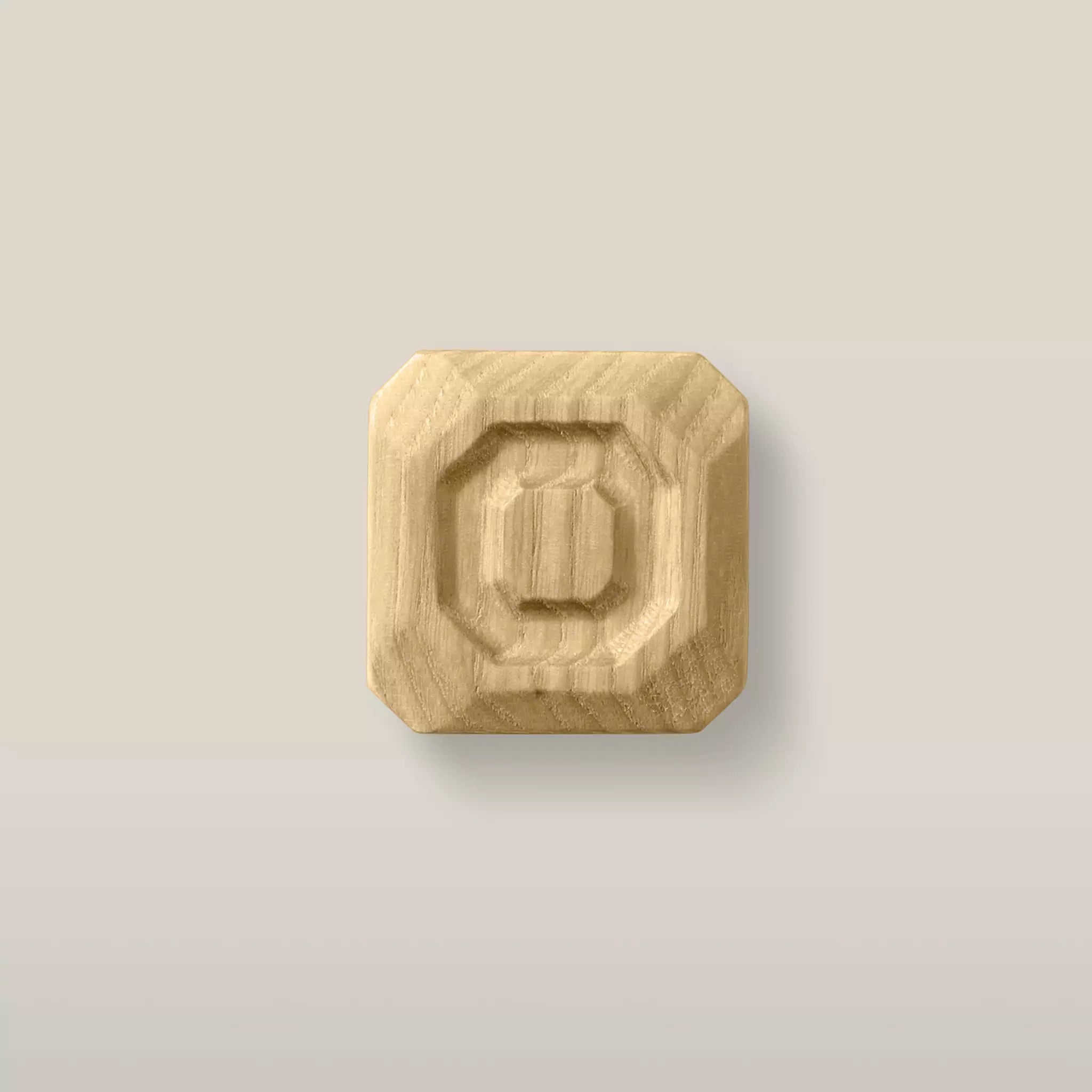 Solid ash stepped octagon cabinet knob in the Oiled finish, front view