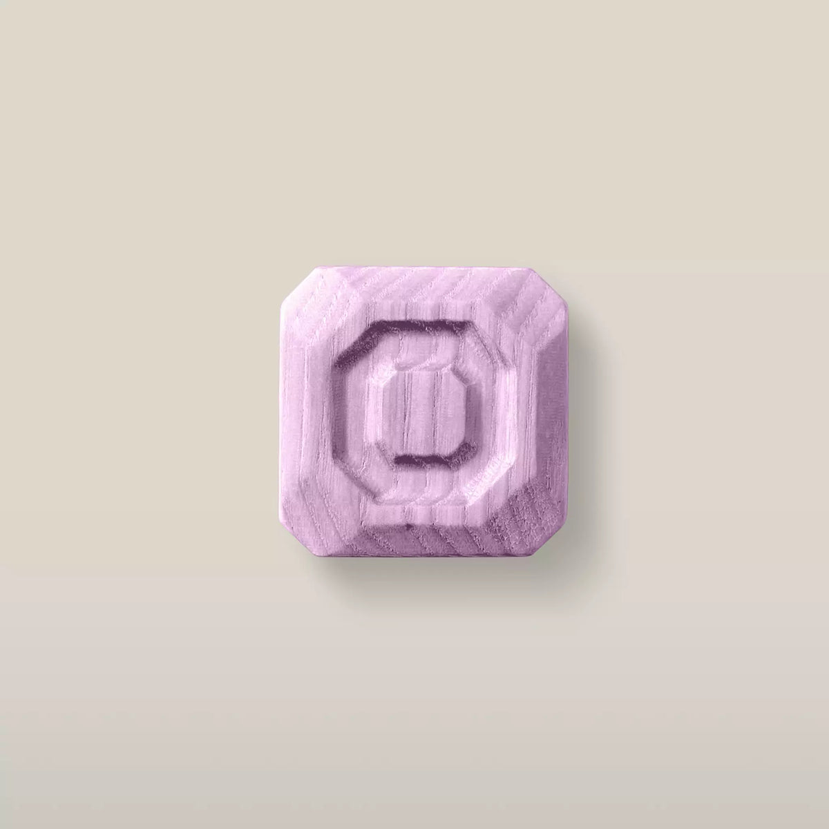 Solid ash stepped octagon cabinet knob in the Purple finish, front view