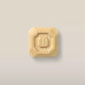 Solid ash stepped octagon cabinet knob in the Unfinished finish, front view