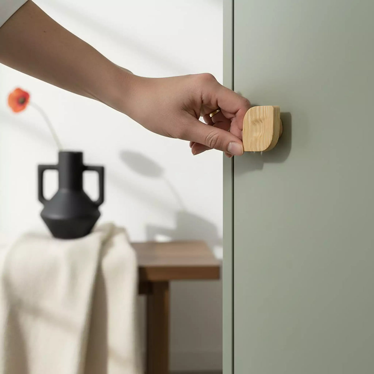 Solid ash twist cabinet knob, front view