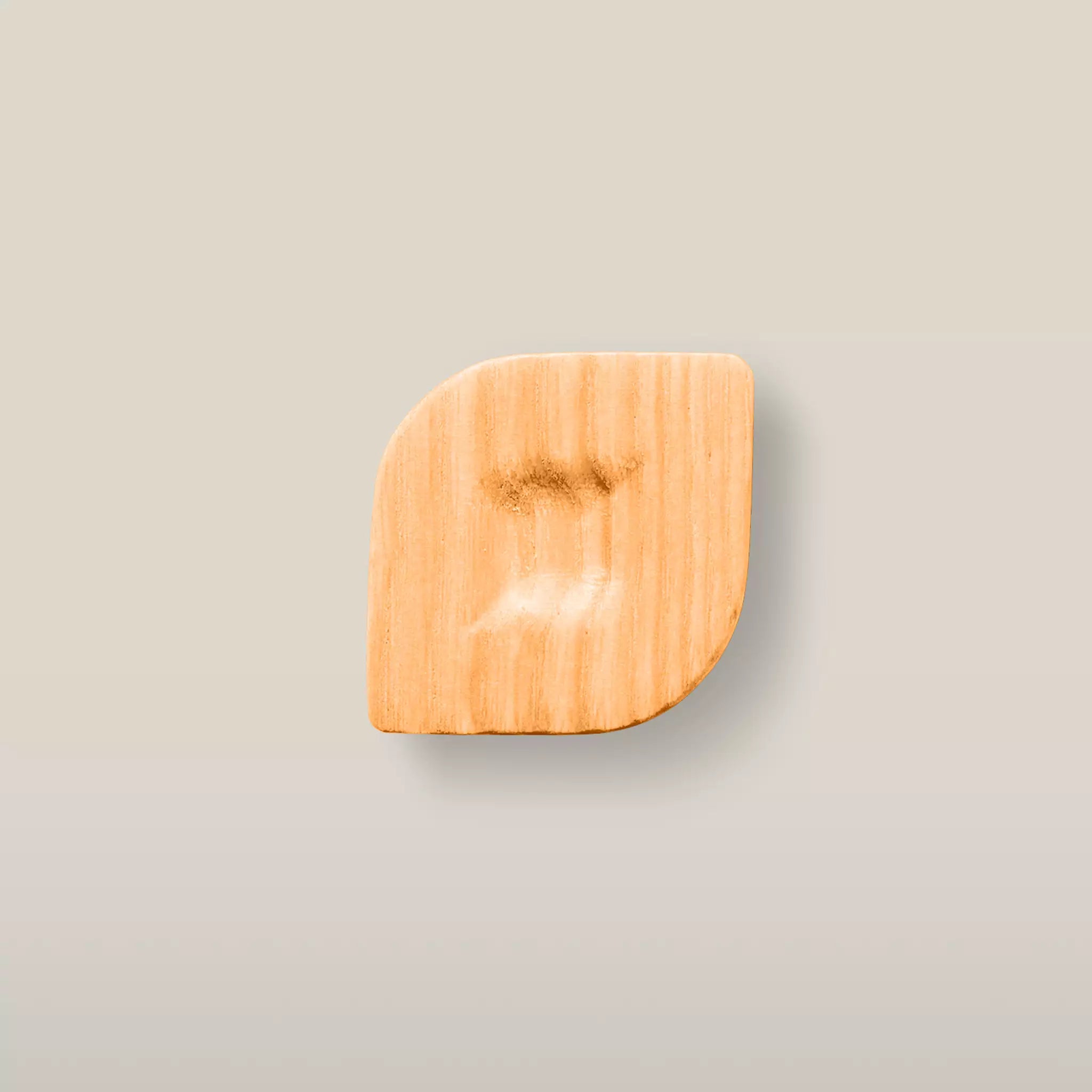 Solid ash twist cabinet knob in the Orange finish, front view