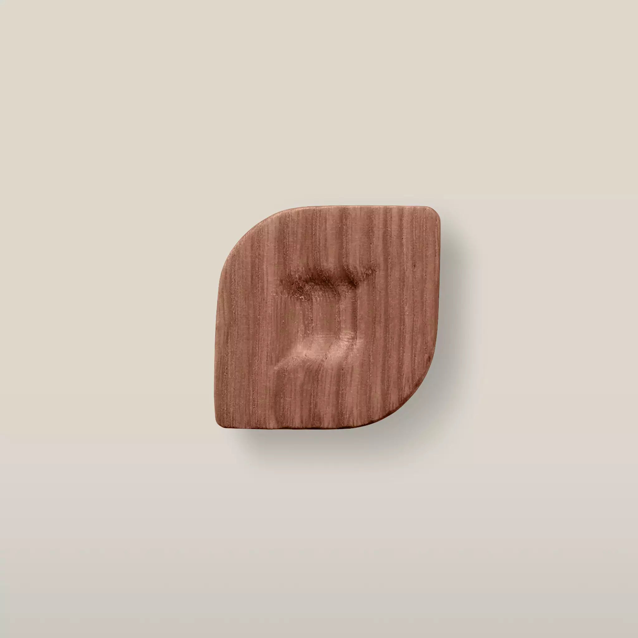 Solid ash twist cabinet knob in the Walnut finish, front view