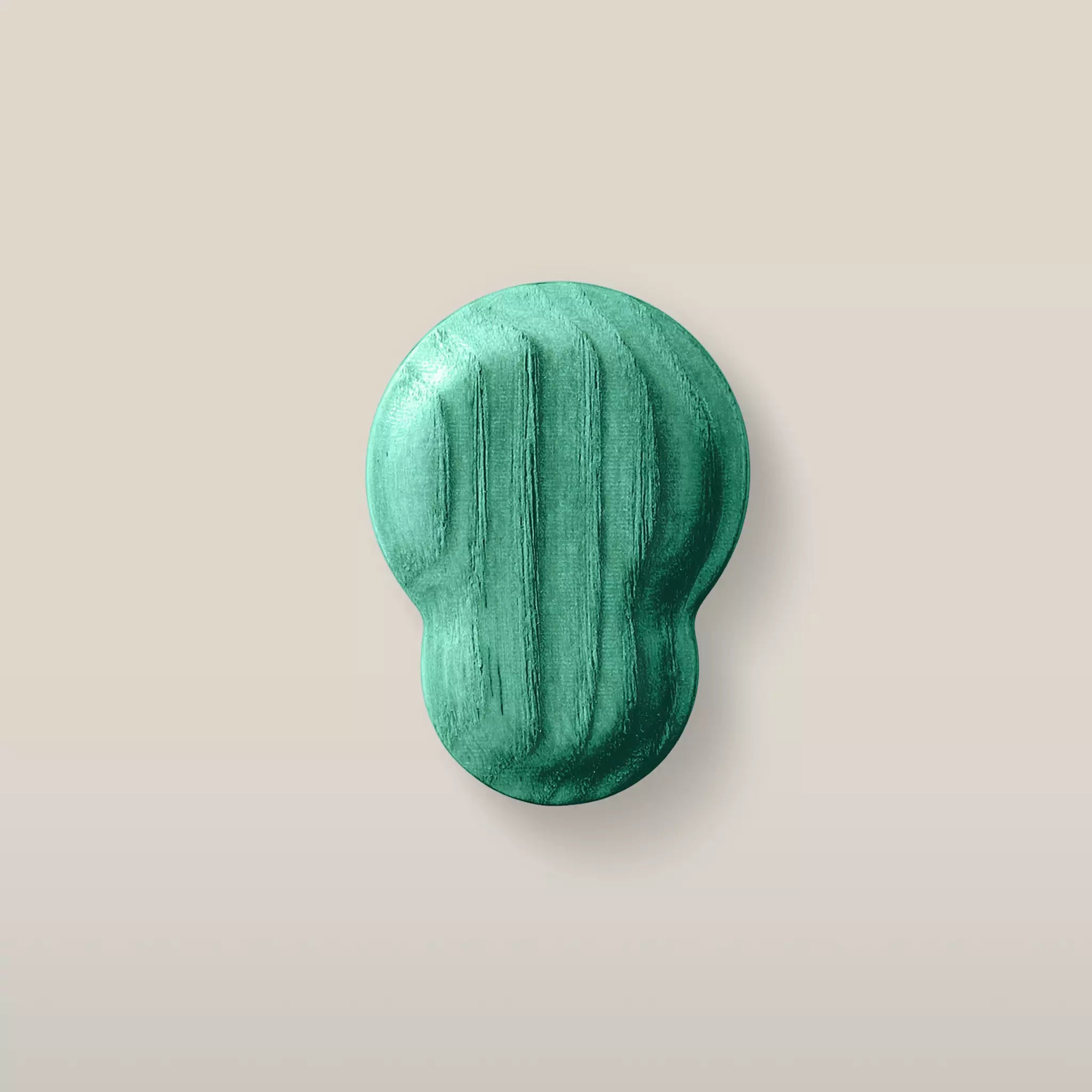 Solid ash fluted cabinet knob in the Green finish, front view