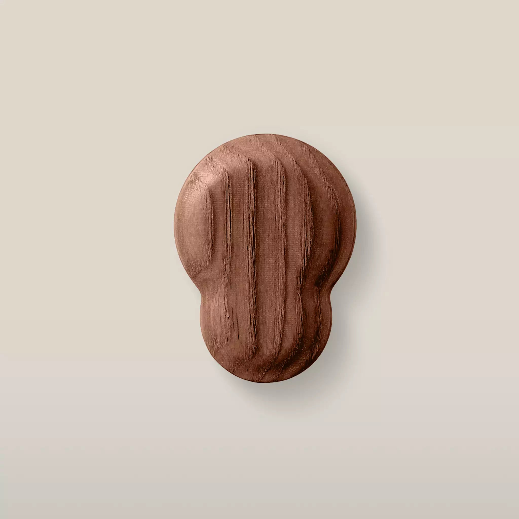 Solid ash fluted cabinet knob in the Walnut finish, front view