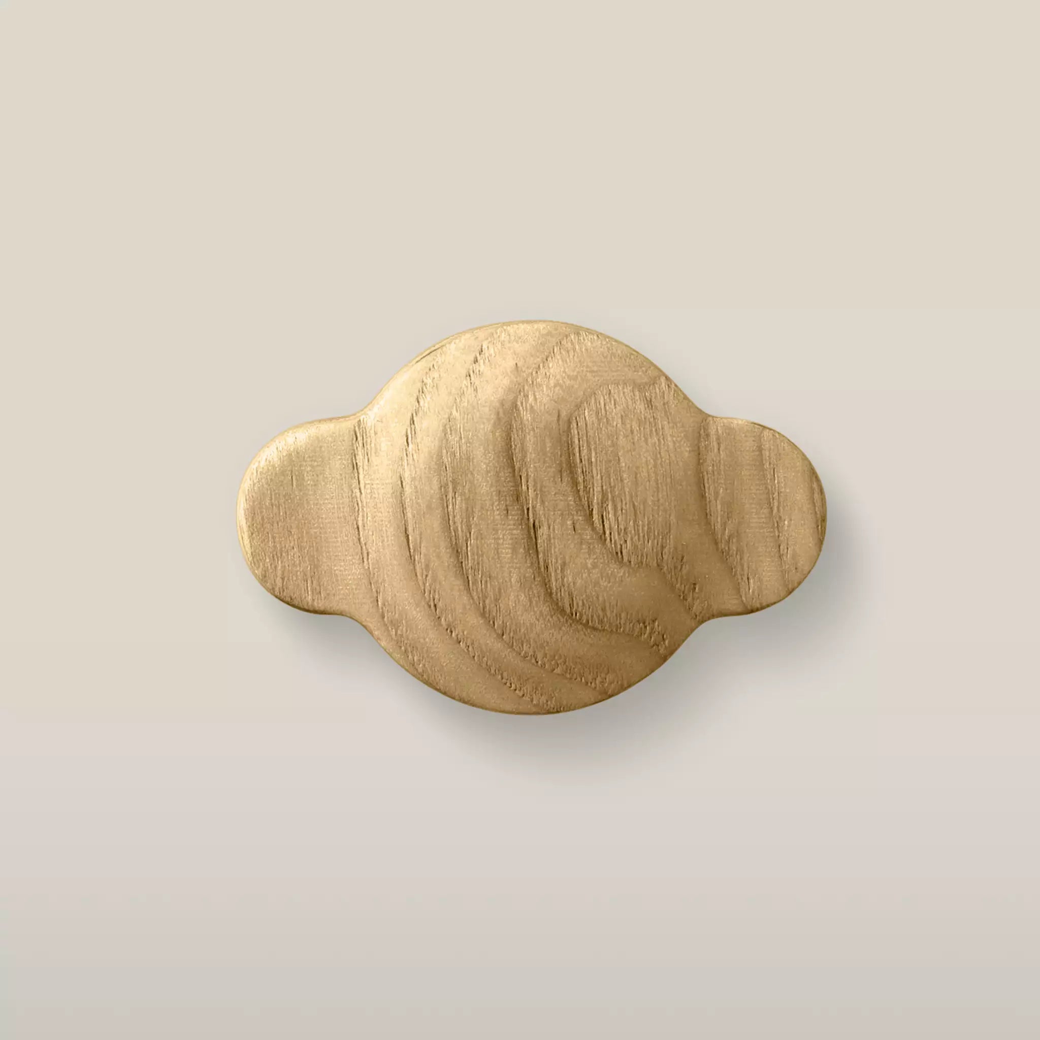Solid ash wave cabinet knob in the Oiled finish, front view