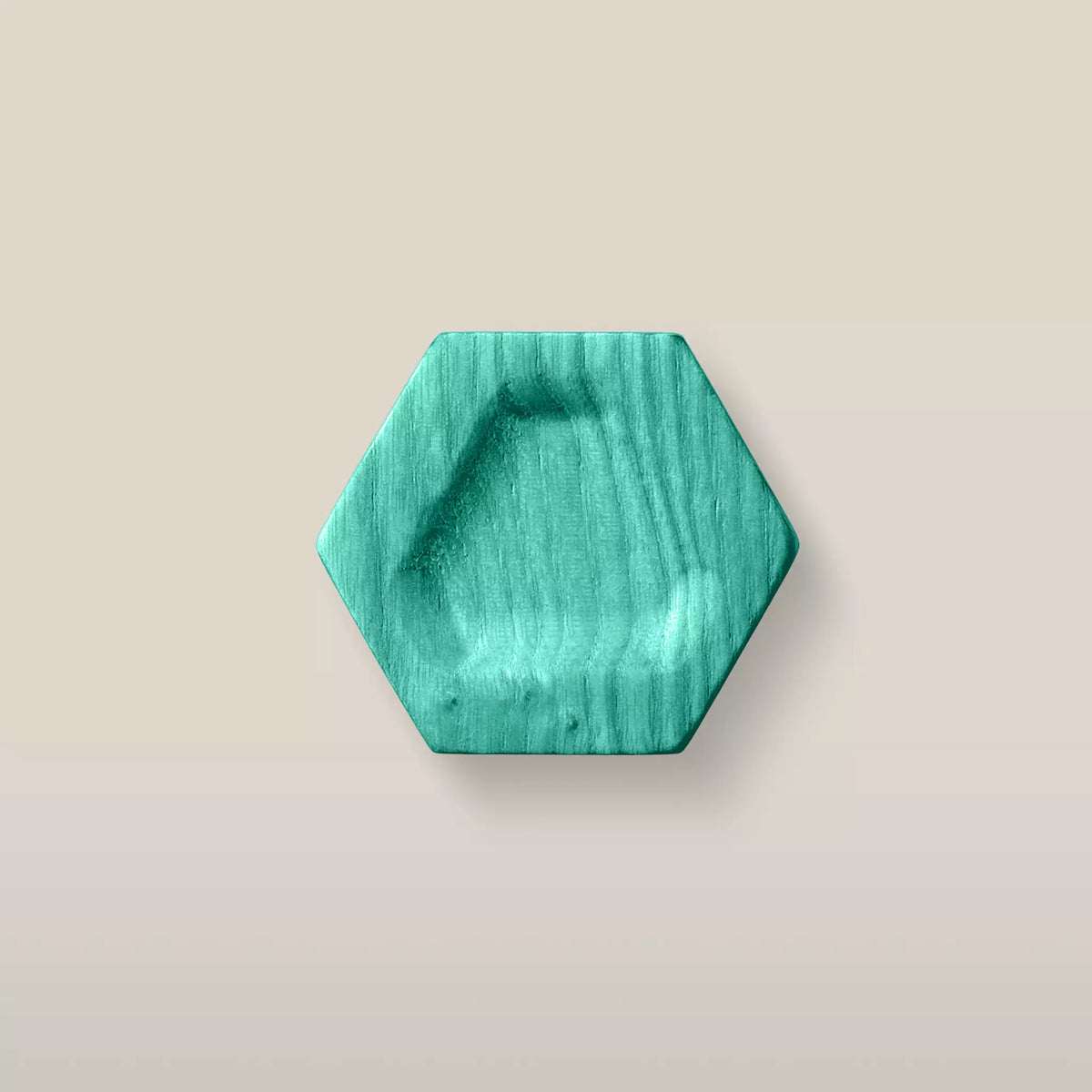 Solid ash carved hexagon cabinet knob in the Green finish, front view