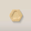 Solid ash carved hexagon cabinet knob in the Unfinished finish, front view