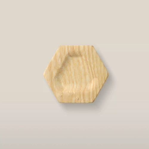 Solid ash carved hexagon cabinet knob in the Unfinished finish, front view