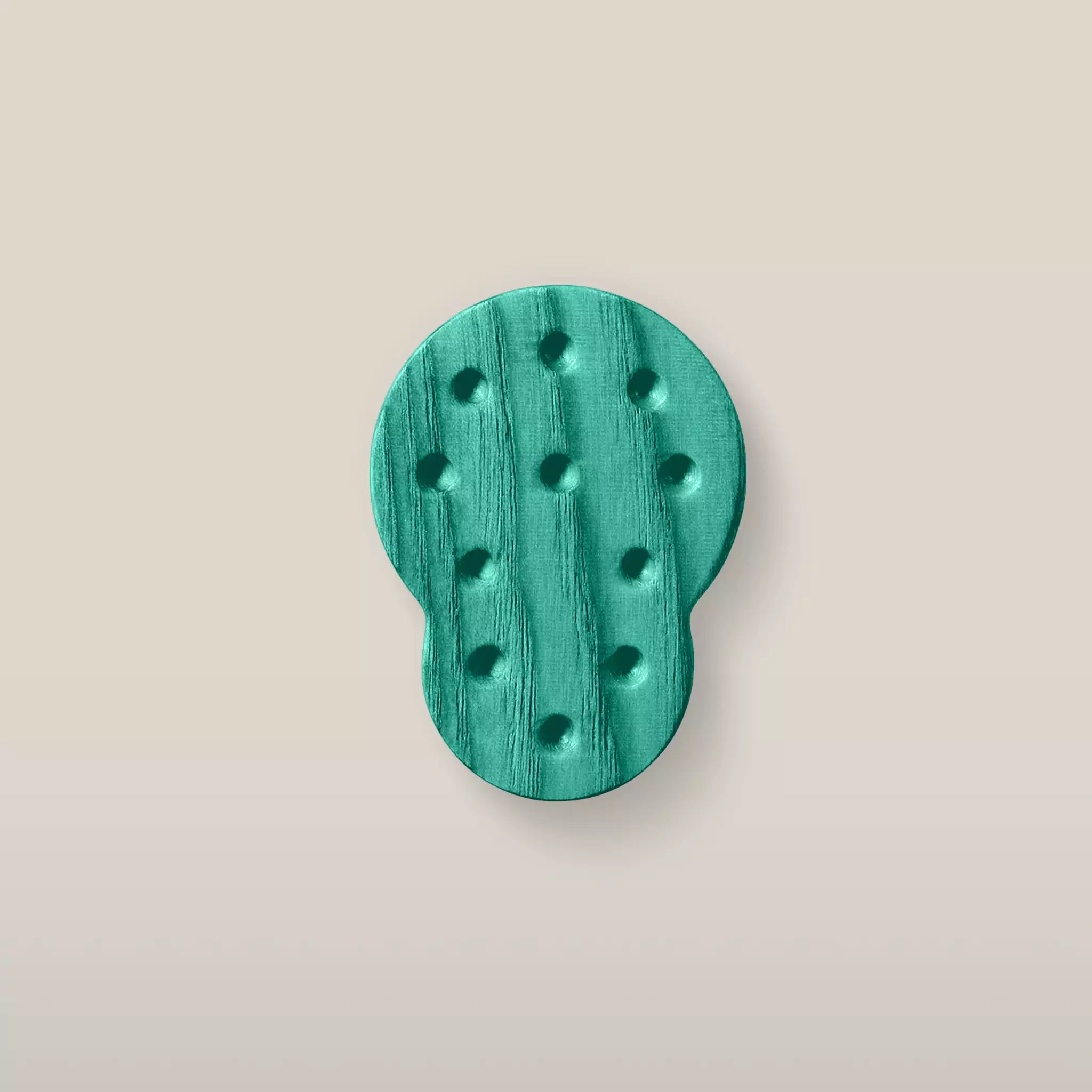 Solid ash dotted cabinet knob in the Green finish, front view