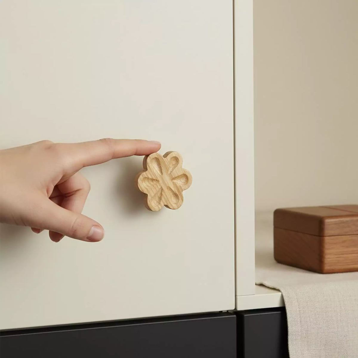 Solid ash carved flower cabinet knob, front view