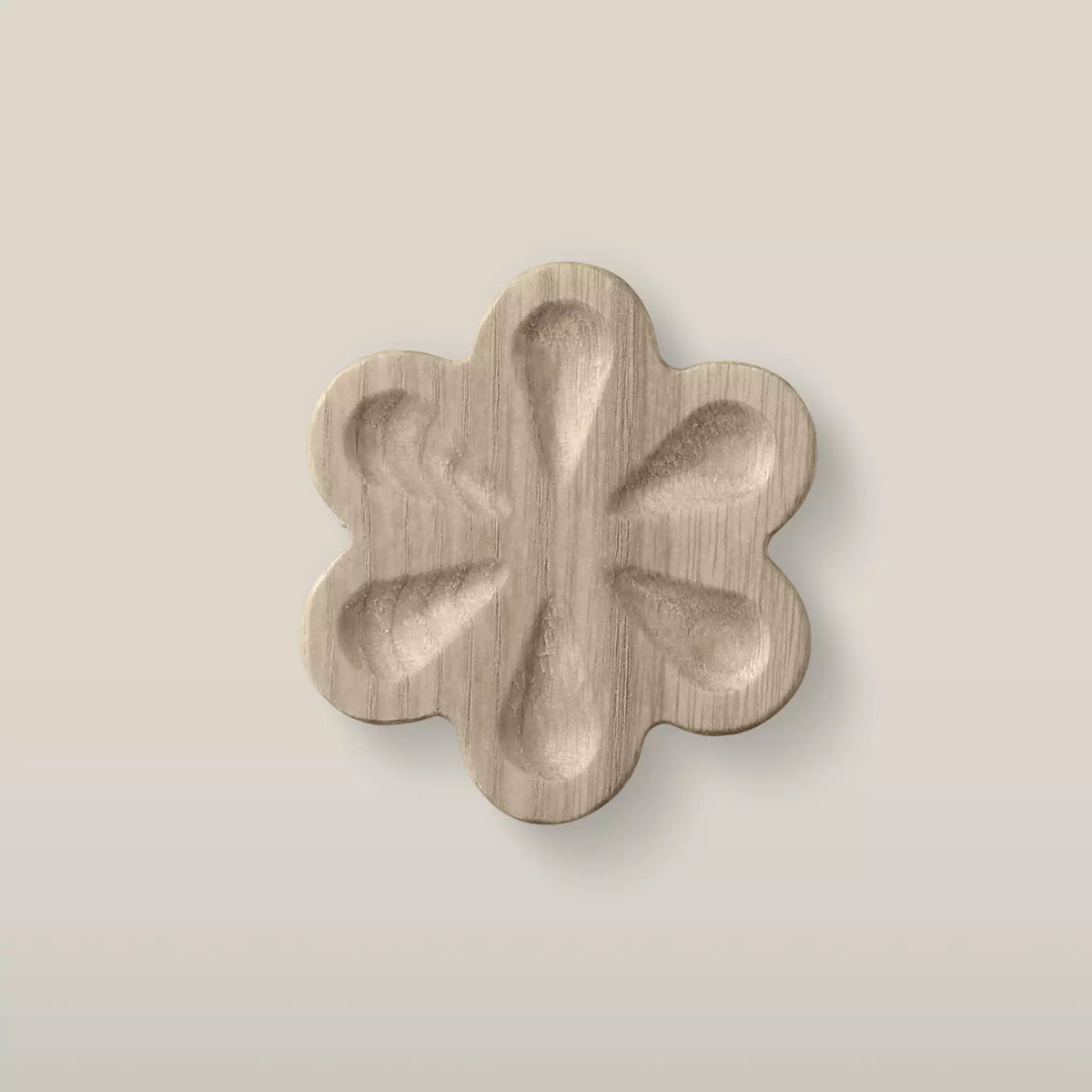 Solid ash carved flower cabinet knob in the Cappuccino finish, front view
