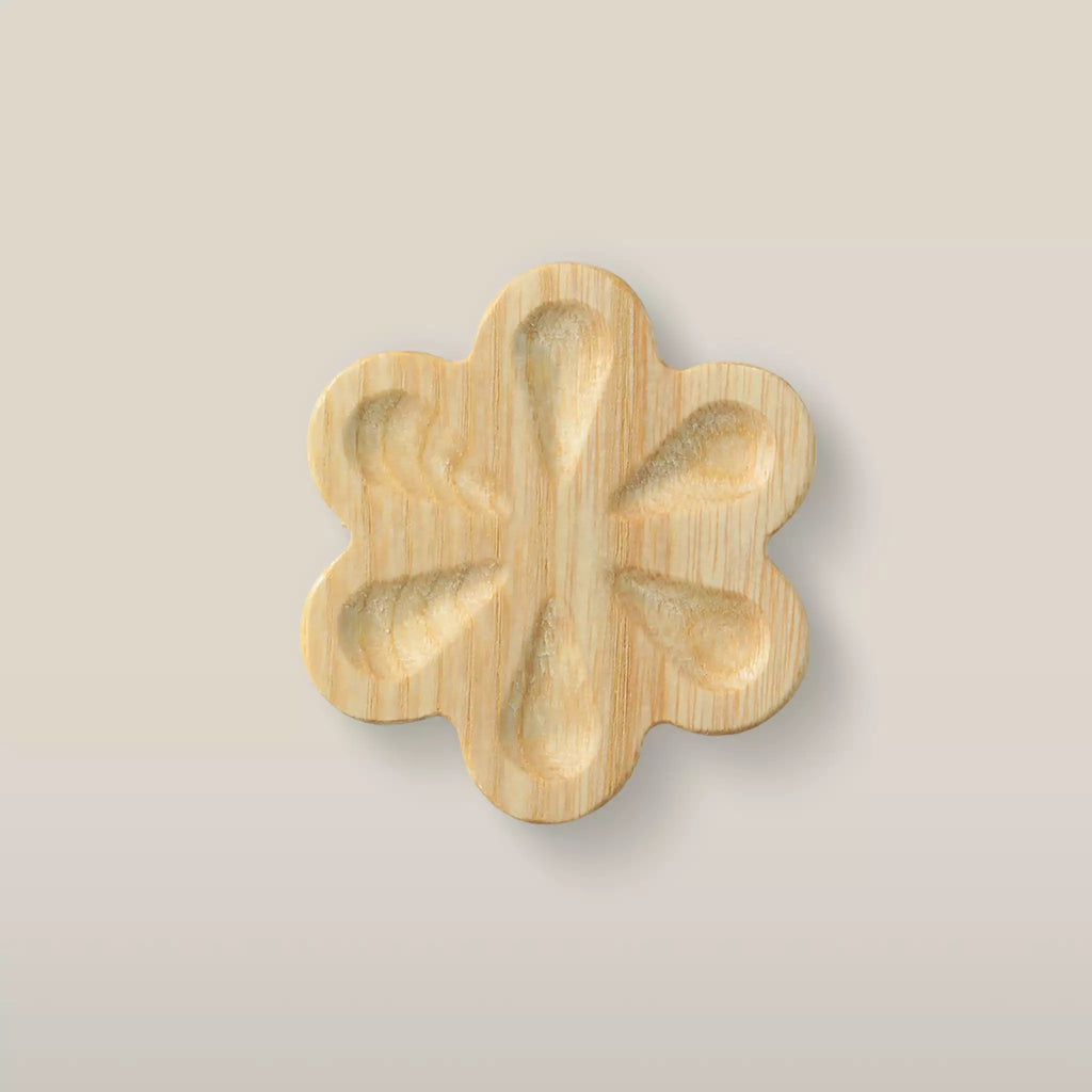Solid ash carved flower cabinet knob in the Unfinished finish, front view