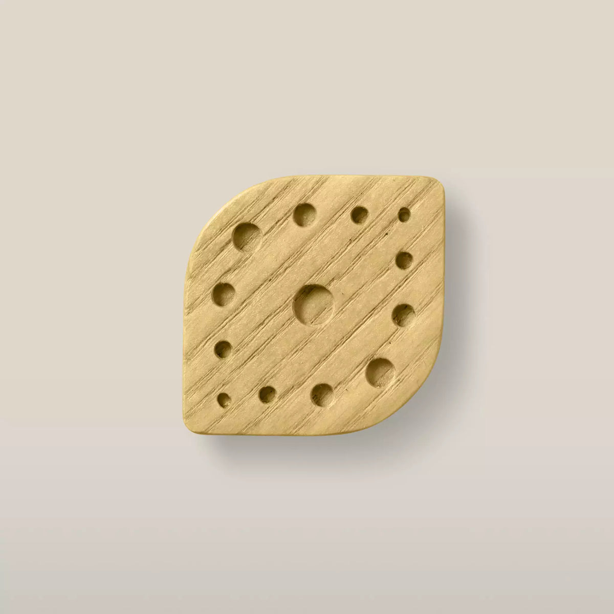Solid ash constellation cabinet knob in the Cream finish, front view
